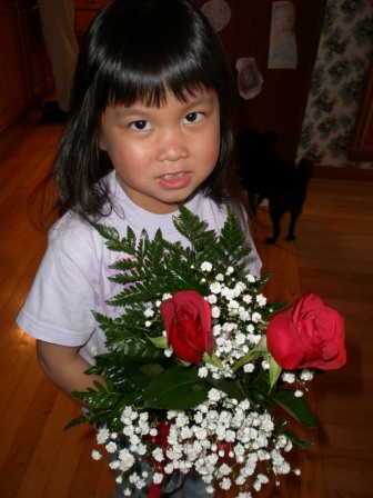 Kasen with Valentine roses from Daddy